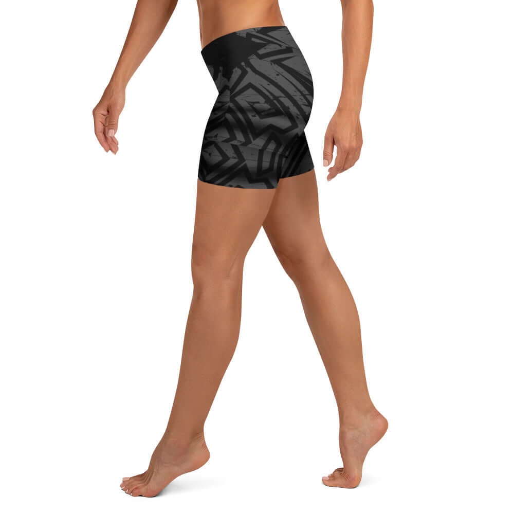 Women’s MotionTech shorts in geometric black pattern, designed for flexibility and movement during workouts.