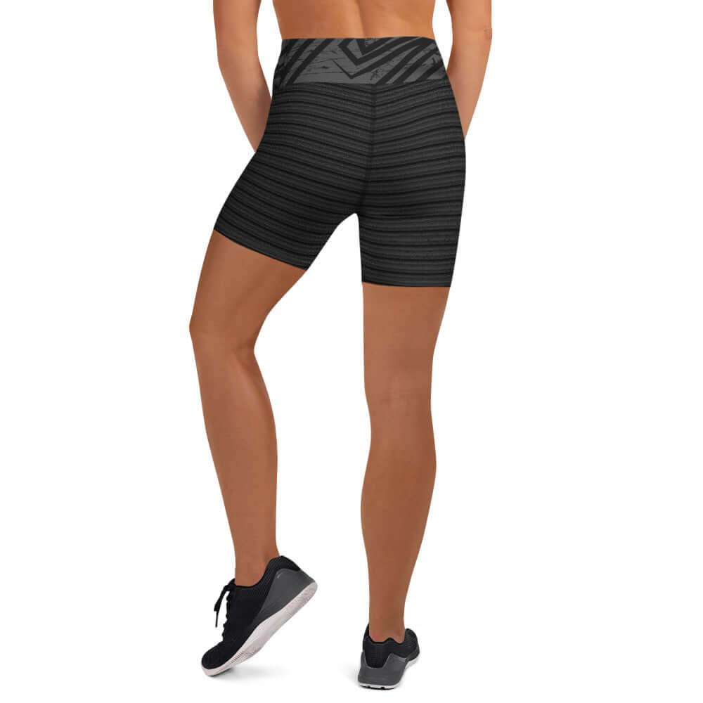 Back view of women's ribbed high-waisted shorts, showcasing textured design and smooth stretch fabric for comfort.