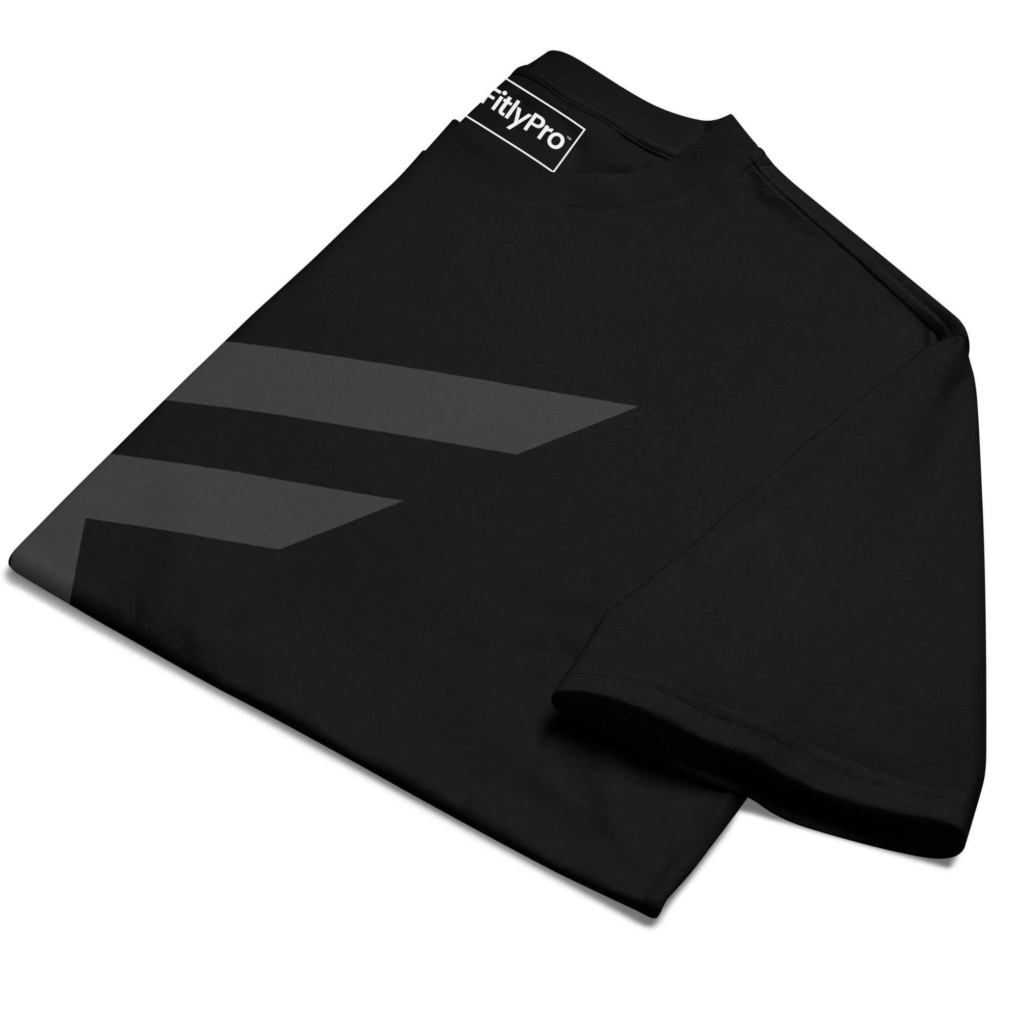 StreetCore Oversized Drop Shoulder Fit black heavyweight tee folded with stylish graphic design