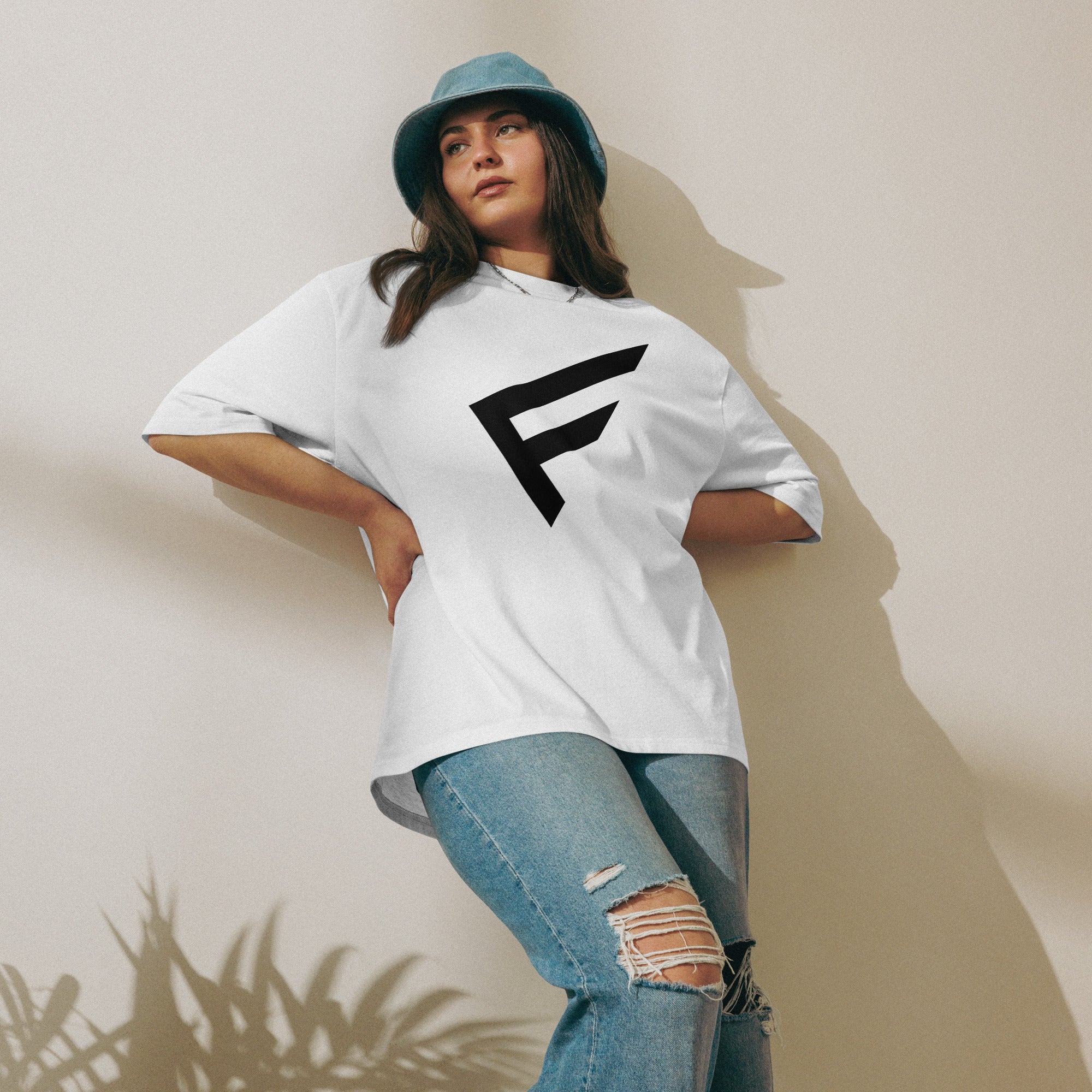 Model wearing the StreetCore Oversized Drop Shoulder Fit tee with a bold graphic design and relaxed style.