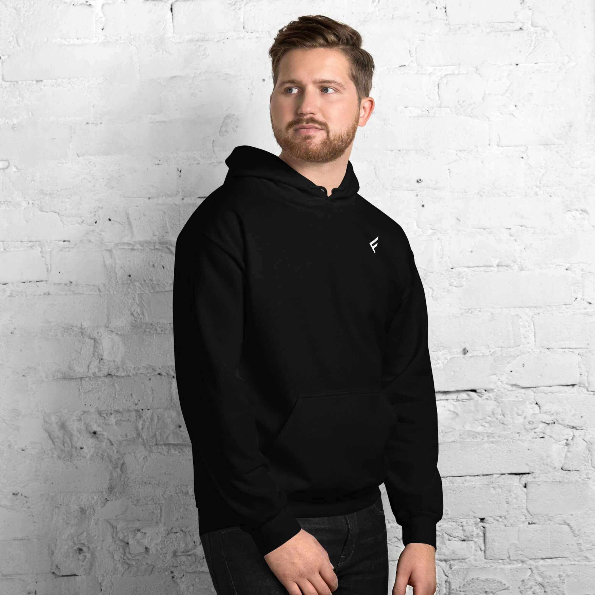 Men's black hoodie from the Core Collection, made from a soft cotton blend for comfort and style.