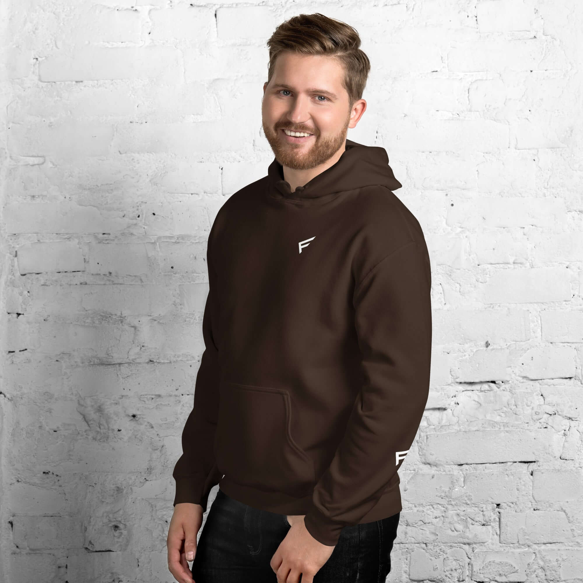 Man wearing a brown men's hoodie from the Core Collection, perfect for comfort and style.