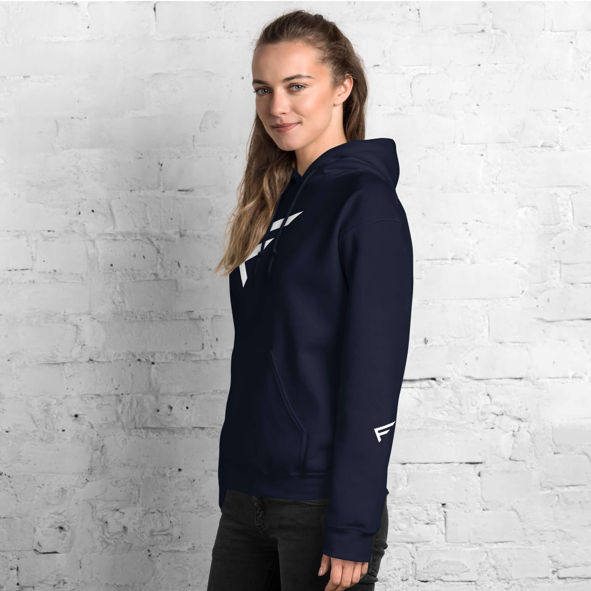 Women's navy hoodie with signature 'F' emblem, designed for comfort and bold movement.