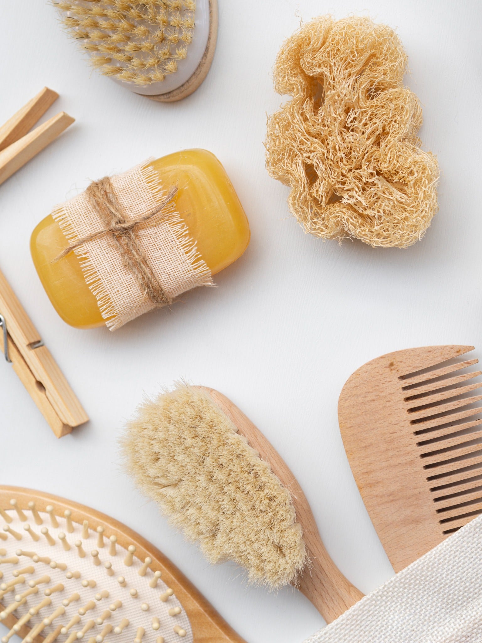 Bath brushes, soap and a compact loofah